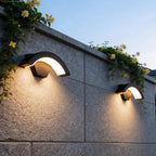 Black Curved Outdoor Wall Light - Minimalist LED Sconce with Soft Warm Glow for Modern Homes