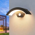 Black Curved Outdoor Wall Light - Minimalist LED Sconce with Soft Warm Glow for Modern Homes