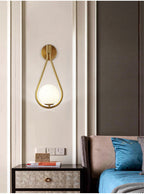 Minimalist Brass Teardrop Wall Lamp with Frosted Glass Shade